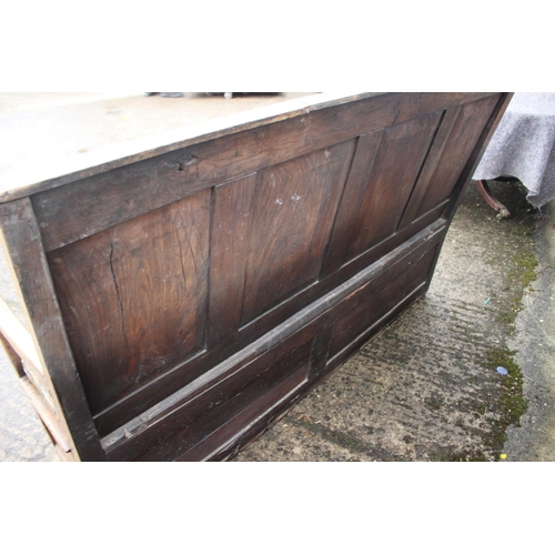 468 - A late Georgian oak four panel back box seat settle, on stile supports, 68