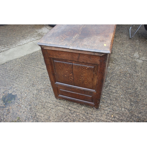 469 - An 18th century oak triple panel front mule chest, fitted two drawers, on stile supports, 53