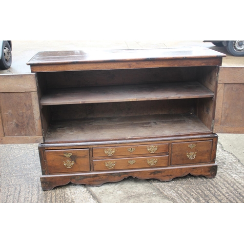 470 - An 18th century oak mule chest, now converted as a cupboard, enclosed two ogee panelled doors over t... 