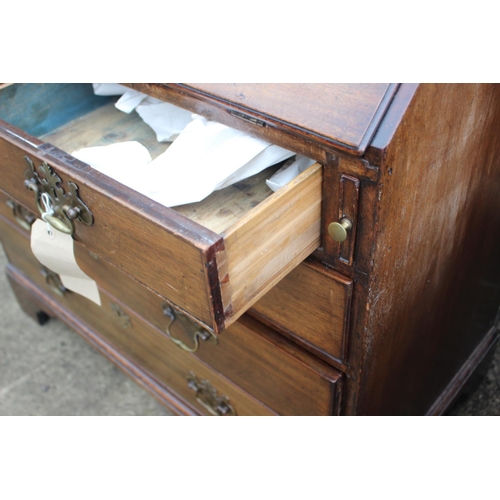 471 - A George III mahogany fall front bureau with interior fitted drawers, pigeonholes and secret compart... 