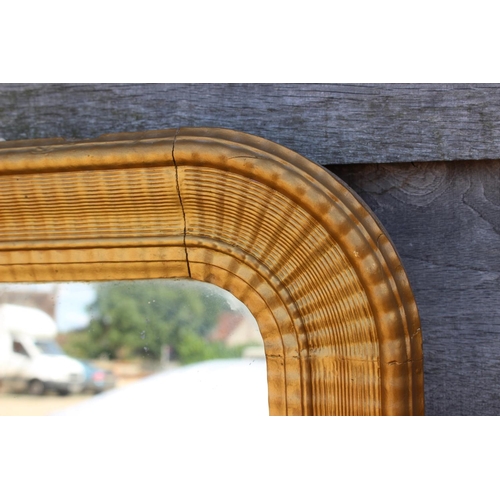 490 - A late 19th century arch top overmantel mirror, in gilt frame, plate 48