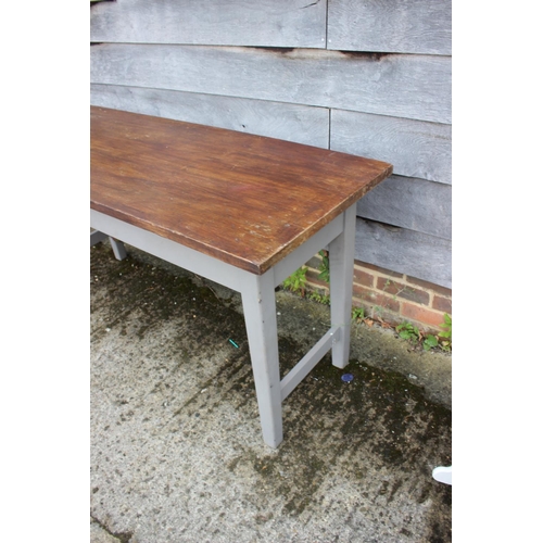 510 - A kitchen table with hardwood top, and painted base and frame, 60