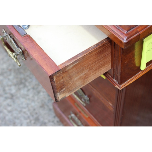 554 - An Edwardian walnut double pedestal desk with brown tooled leather top over three drawers and six fu... 