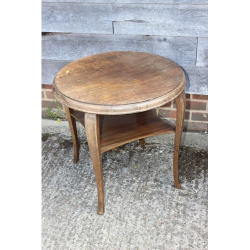 576 - A walnut rectangular two-tier occasional table, on cabriole supports, 26 1/2