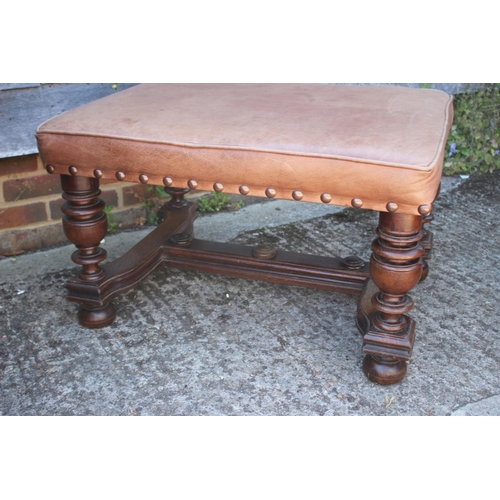 584 - An early 20th century oak framed stool, on turned oak frame united by stretcher rails, 31