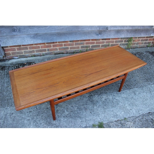 605 - A Glostrup Mobelfabkik Denmark  1960s teak ‘Surfboard’ coffee table with slatted undertier, on turne... 