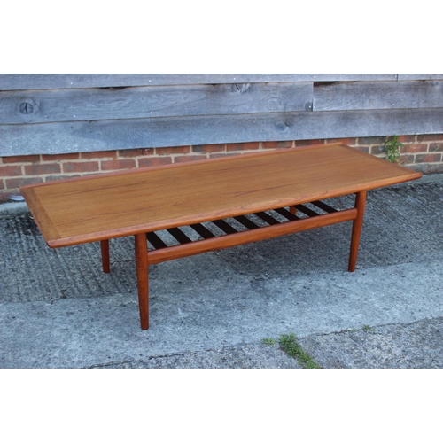 605 - A Glostrup Mobelfabkik Denmark  1960s teak ‘Surfboard’ coffee table with slatted undertier, on turne... 