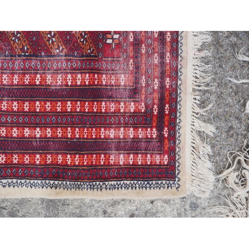 670 - A Bokhara prayer rug of traditional design on a camel ground, 49