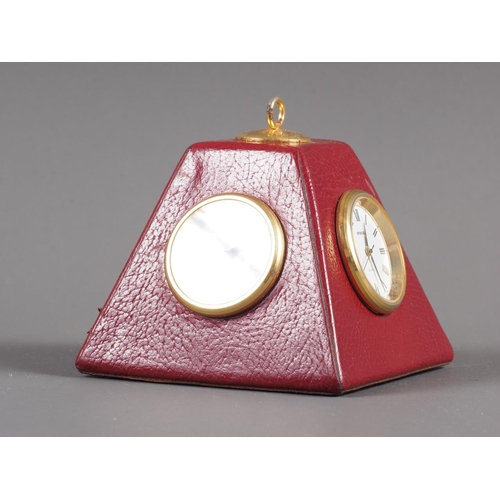 79 - A Smythson  of London desktop clock, thermometer and hygrometer of pyramid form, in crimson morocco ... 