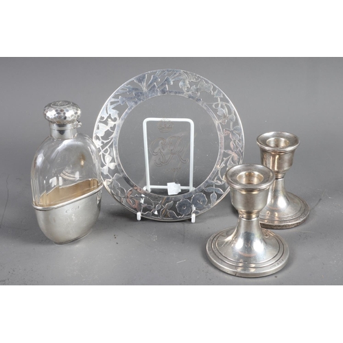 270 - A glass spirit flask with silver cap and removable cup, a silver mounted glass teapot stand and a pa... 