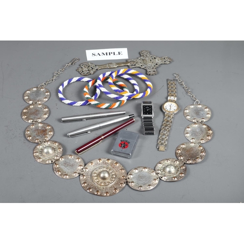 299 - A Mexican white metal twisted link bracelet, four beaded bangles, three pens, two wristwatches, a 