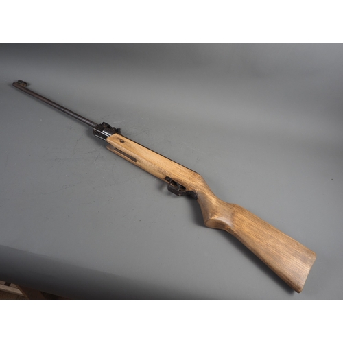 110 - A Relum LG527 .22 calibre break barrel air rifle with a black canvas carry bag and a gun cleaning ki... 