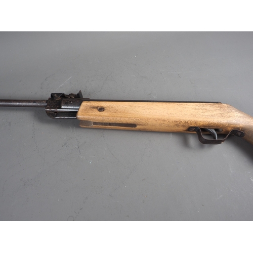 110 - A Relum LG527 .22 calibre break barrel air rifle with a black canvas carry bag and a gun cleaning ki... 