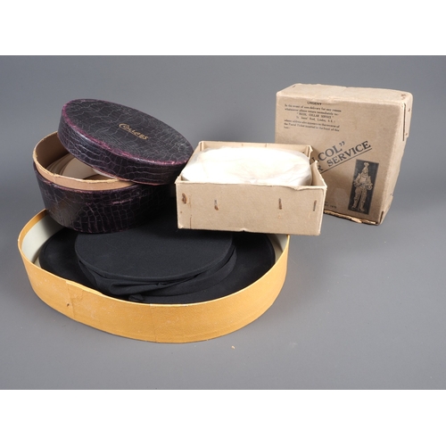 128 - An Austin Reed Ltd collapsible top hat, a collar box and a number of collars