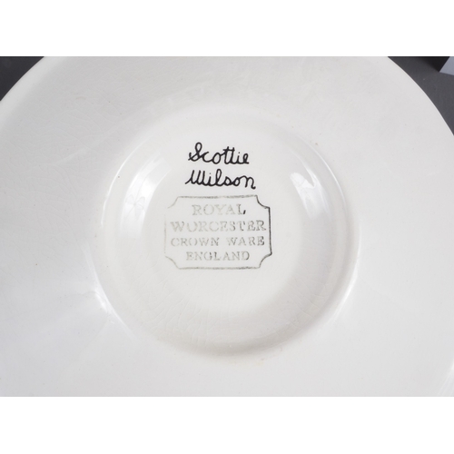 14 - A Royal Worcester Crown Ware Scottie Wilson combination service, including tureens, soups, meat plat... 