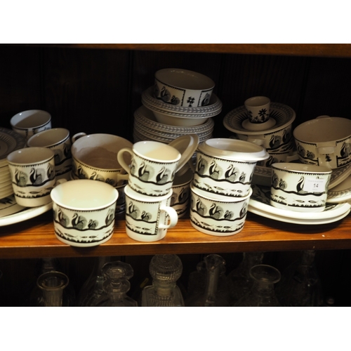 14 - A Royal Worcester Crown Ware Scottie Wilson combination service, including tureens, soups, meat plat... 