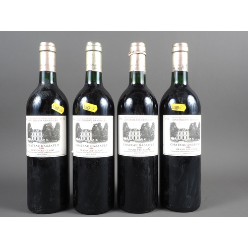 154 - Four bottles of 1986 Saint-Emilion Grand Cru Chateau Dassault Grand Cru Classe