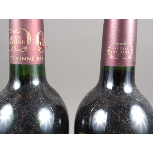 156 - A bottle of 1996 Chateau Laroque Saint-Emilion Grand Cru Grand Cru Classe, and another, 2003 vintage