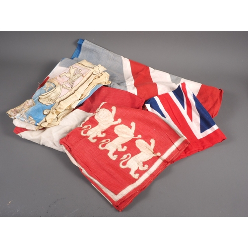 184 - A vintage union jack flag, 68” x 46” approx, another union jack flag and three other fla... 