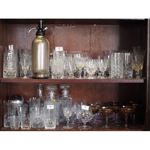 20 - A quantity of glassware, including tumblers, Babycham glasses, a soda syphon, highballs and other it... 