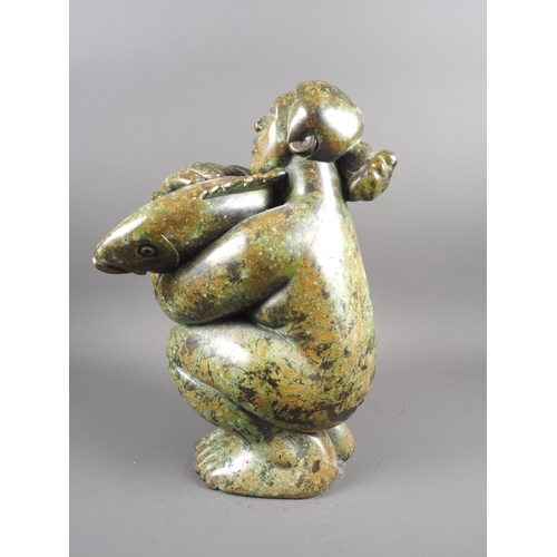 204 - †Jon Buck: a patinated bronze figure, 