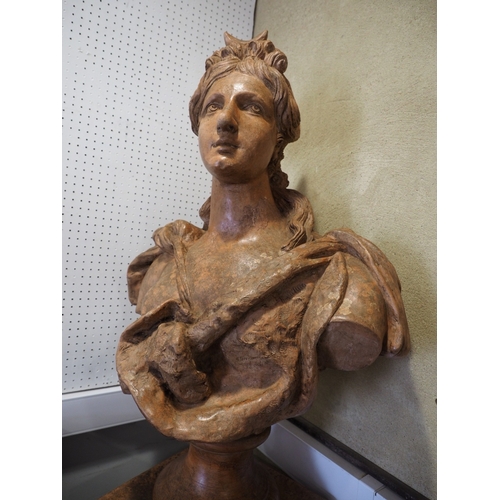 214 - An early 20th century Italian terracotta bust of Diana, on relief decorated pedestal, 74