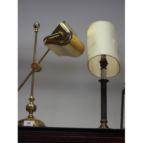 230 - A gilt metal adjustable desk lamp, on circular base, and a fluted column table lamp, 13