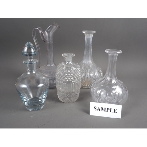 41 - A quantity of mainly cut glass decanters, including a Royal Doulton decanter, various (some without ... 