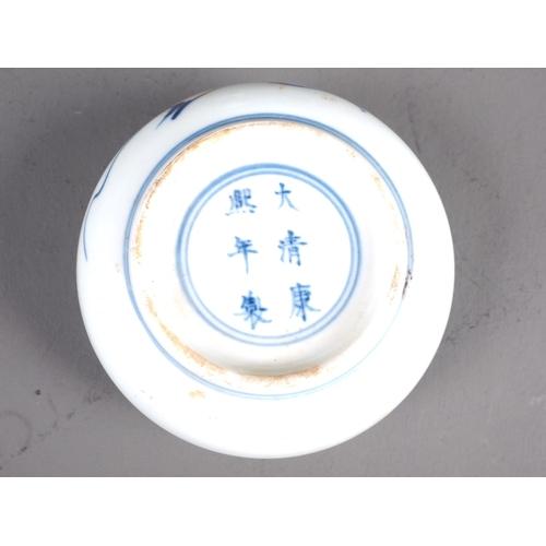 60 - A Chinese blue and white dish with dragon and cloud decoration, seal mark to base, 4” dia, a blue an... 