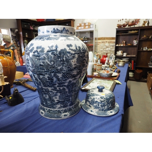 67 - A Chinese blue and white jar and cover with landscape decoration, 30