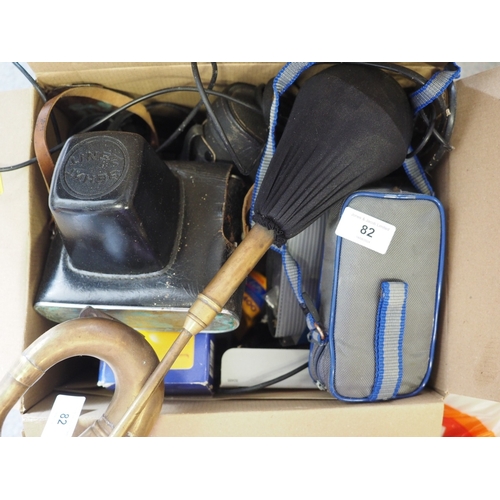 82 - A quantity of miscellaneous cameras, accessories, binoculars and a brass car horn