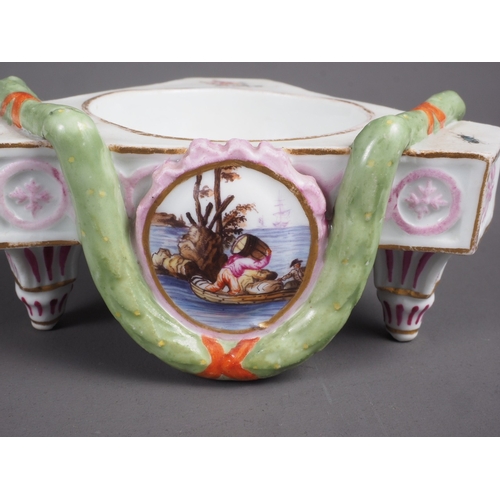 9 - A set of four Continental porcelain table salts with swag and painted plaque decoration on three tap... 