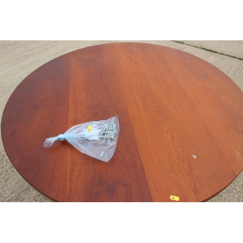 527 - A modern cherrywood circular dining table, on tripod splay support, 42