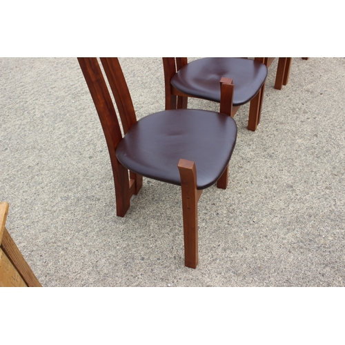 527 - A modern cherrywood circular dining table, on tripod splay support, 42