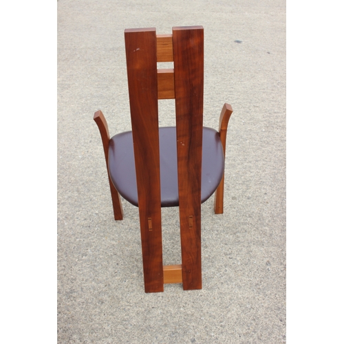 527 - A modern cherrywood circular dining table, on tripod splay support, 42