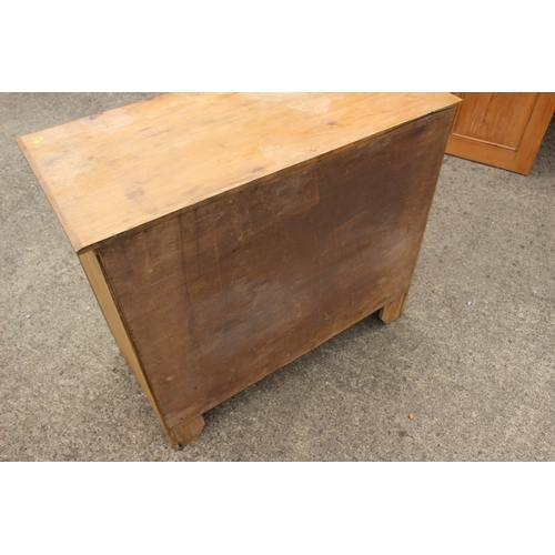 620 - A pine chest of three long drawers, 36