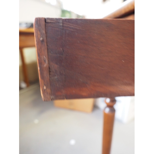 431 - A 19th century mahogany drop flap sewing table, fitted single drawer, on turned and castored support... 