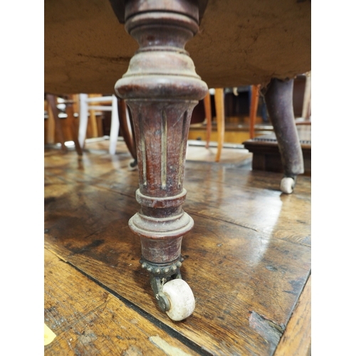 438 - A Victorian carved walnut low seat occasional chair with oval panel back, on turned and castored sup... 