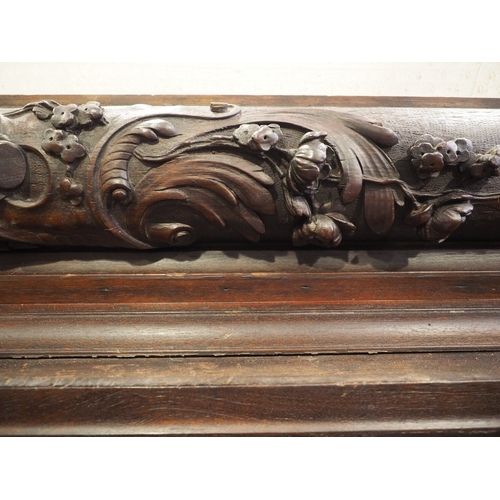 464 - An early 18th century carved oak overmantel with acanthus scrolled decoration, 78