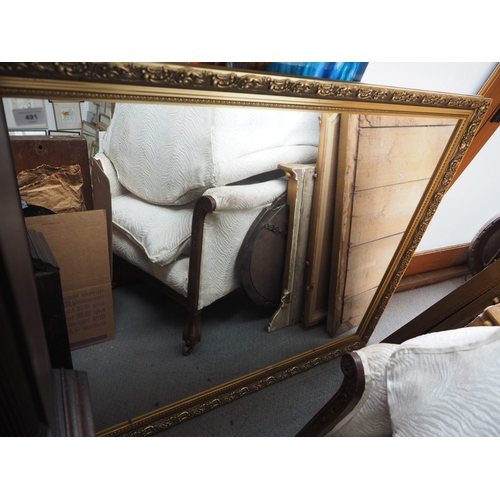 491 - A gilt framed wall mirror with bevelled plate, 35