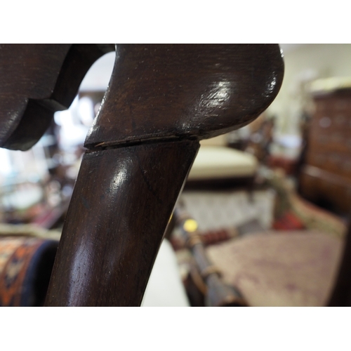 496 - A late 19th century rosewood side chair with padded seat and back, on faceted supports