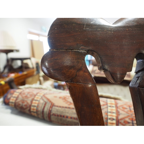 496 - A late 19th century rosewood side chair with padded seat and back, on faceted supports