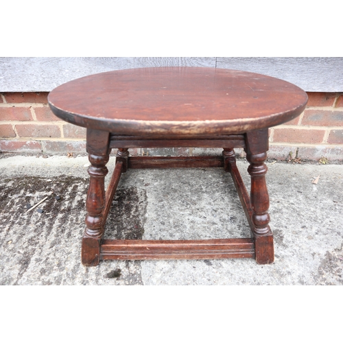 548 - A mahogany drum top occasional table, on tripod support, 20