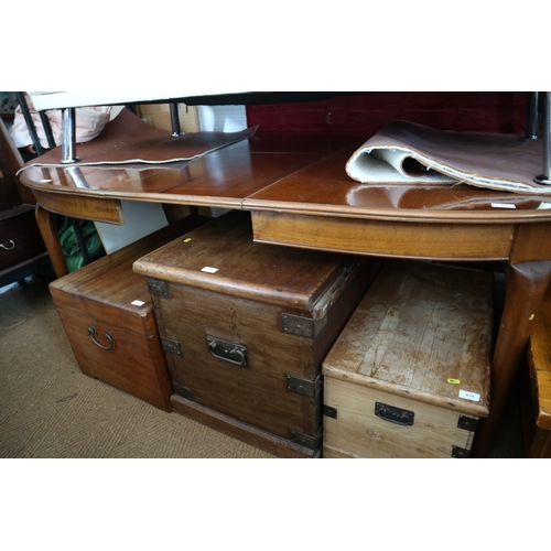 579 - A cherrywood oval extending dining table with folding central leaf, on turned supports and pad feet,... 