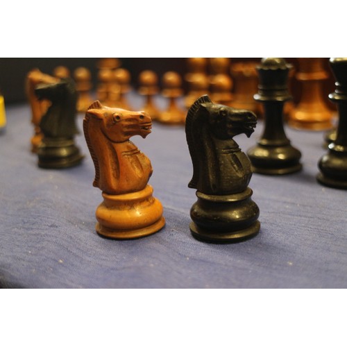 111 - A boxwood and ebonised Staunton style chess set, a Napoleon and Wellington chess set, a 