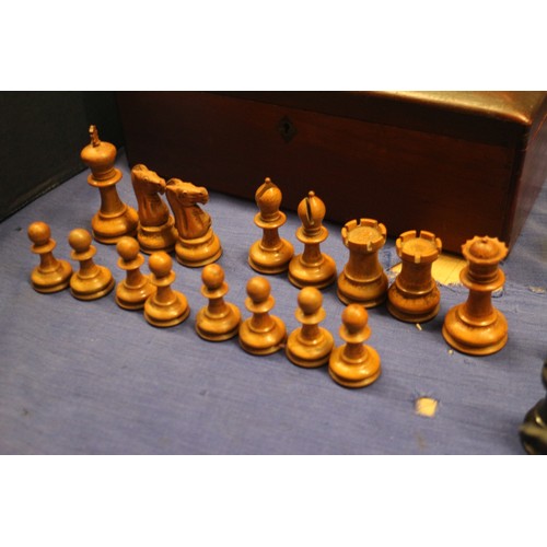 111 - A boxwood and ebonised Staunton style chess set, a Napoleon and Wellington chess set, a 