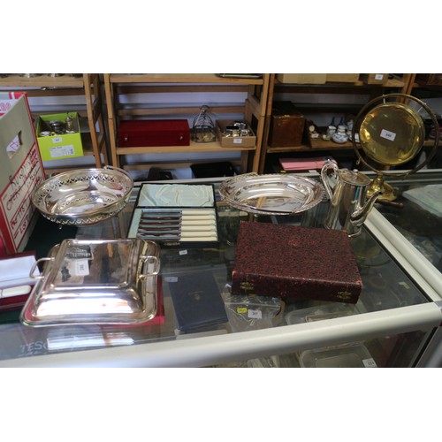 246 - Two silver plated entree dishes and covers, two silver plated swing handled baskets, a Georgian styl... 