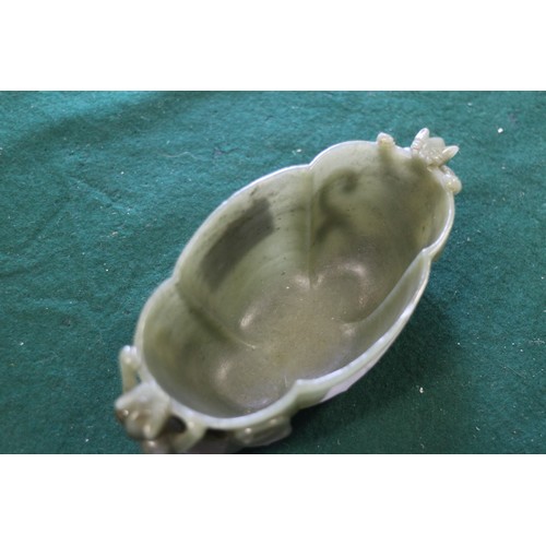 71 - A Chinese carved jade cup with lizard handles, 6