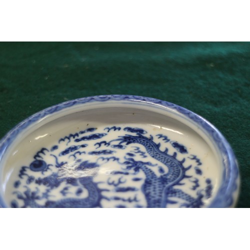 60 - A Chinese blue and white dish with dragon and cloud decoration, seal mark to base, 4” dia, a blue an... 