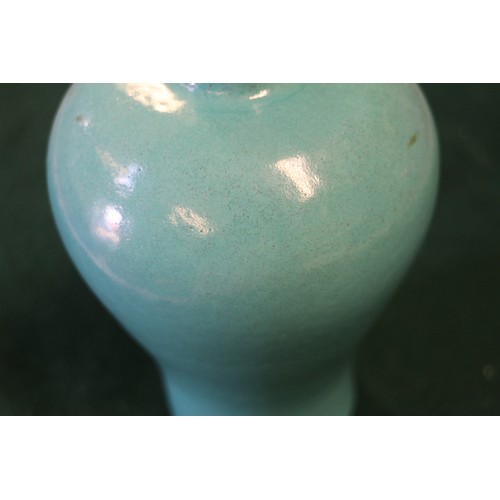 56 - A Chinese meiping turquoise glazed vase, 6 3/4” high, on turned hardwood stand